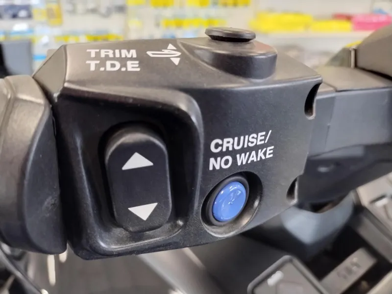 Slide: The Image of 2024 Yamaha WaveRunner GP SVHO control panel with trim and cruise buttons. - 10