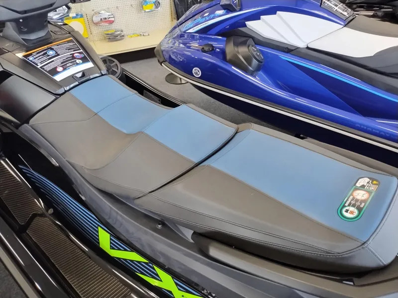 Slide: The Image of 2024 Yamaha WaveRunner VX Deluxe jet ski with sleek design and comfortable seating. - 6