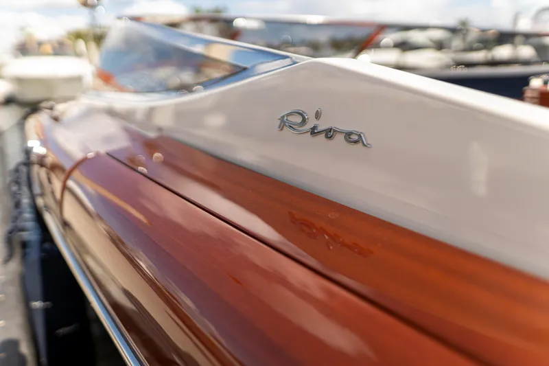 Slide: The Image of 2015 Riva Aquariva Super boat with sleek wooden finish and elegant design. - 19