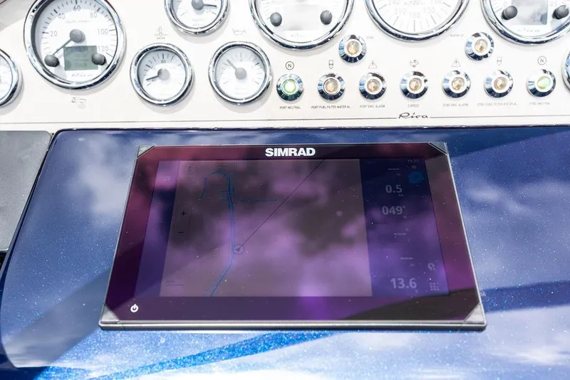 Slide: The Image of Dashboard of 2015 Riva Aquariva Super with Simrad navigation display. - 35
