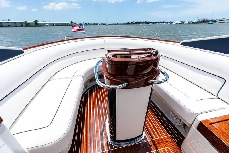Slide: The Image of 2015 Riva Aquariva Super boat interior with elegant wood and white seating. - 43