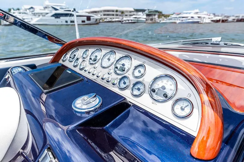 Slide: The Image of Dashboard of a 2015 Riva Aquariva Super yacht with elegant wood and chrome details. - 47