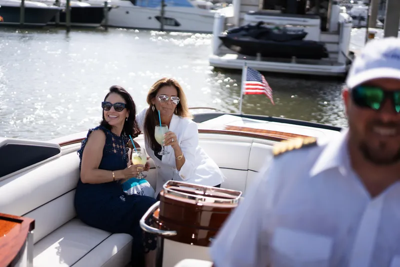 Slide: The Image of Two women enjoying drinks on a 2015 Riva Aquariva Super yacht. - 23