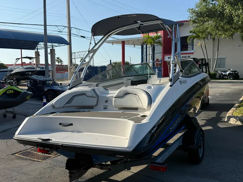 Slide: The Image of 2017 Yamaha AR190 boat on trailer, parked outdoors, rear view. - 5