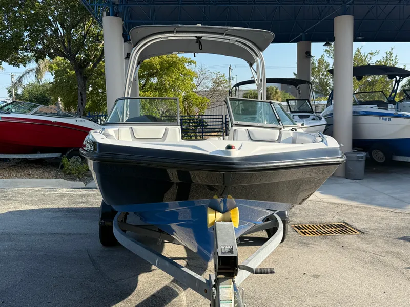 Slide: The Image of 2017 Yamaha AR190 boat on trailer, parked outdoors under a canopy. - 9