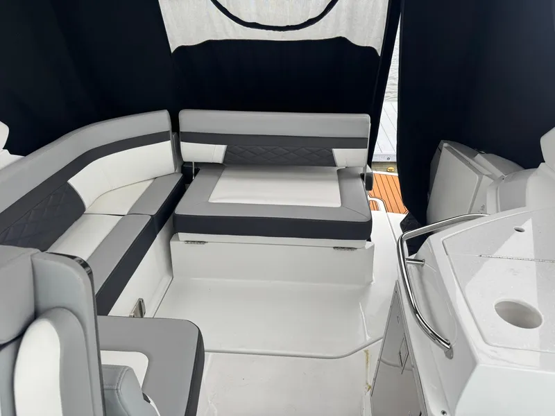 Slide: The Image of Interior of 2020 Monterey 295 Sport Yacht with sleek seating and modern design. - 14