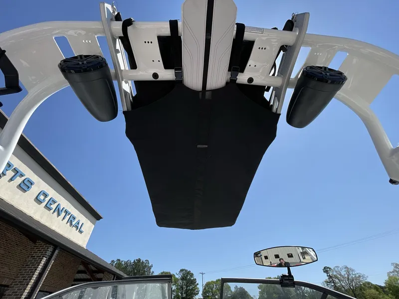 Slide: The Image of 2017 Nautique Super Air G23 boat tower with speakers, viewed from below against blue sky. - 20