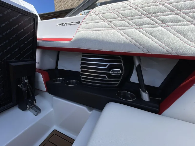 Slide: The Image of Interior of 2017 Nautique Super Air G23 boat with stylish seating and speaker system. - 23