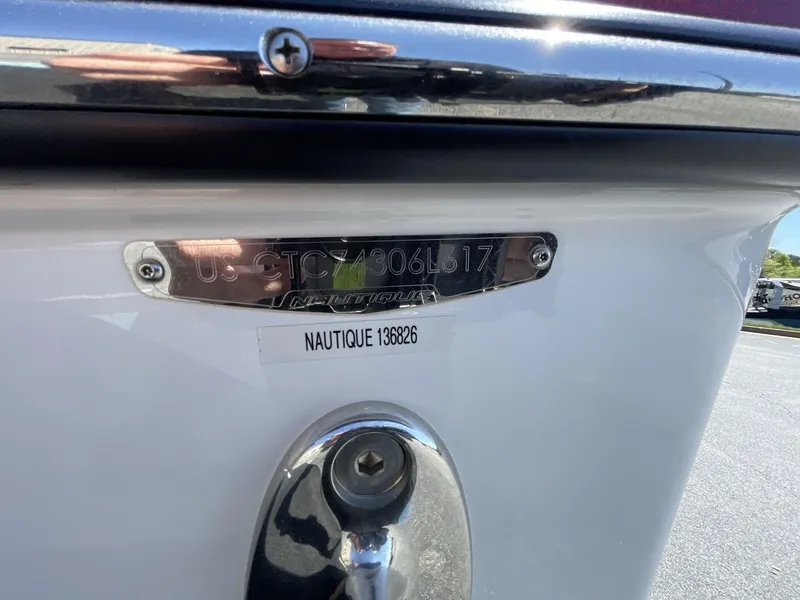 Slide: The Image of 2017 Nautique Super Air G23 boat identification plate and registration number. - 7