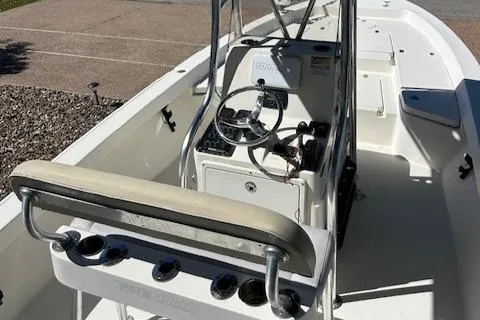Slide: The Image of 2013 Pathfinder 2400 TRS boat interior with steering console and seating. - 5