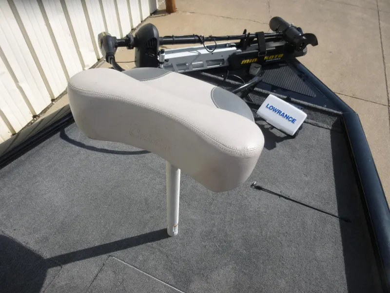 Slide: The Image of 2016 Tracker Pro Team 195 TXW boat deck with seat, trolling motor, and Lowrance device. - 15