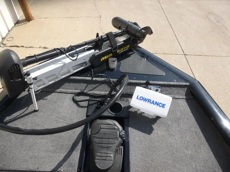 Slide: The Image of 2016 Tracker Pro Team 195 TXW boat with Minn Kota trolling motor and Lowrance fish finder. - 16