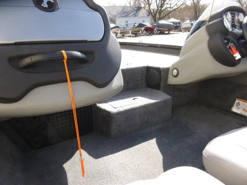 Slide: The Image of 2016 Tracker Pro Team 195 TXW boat interior with seating and dashboard details. - 30