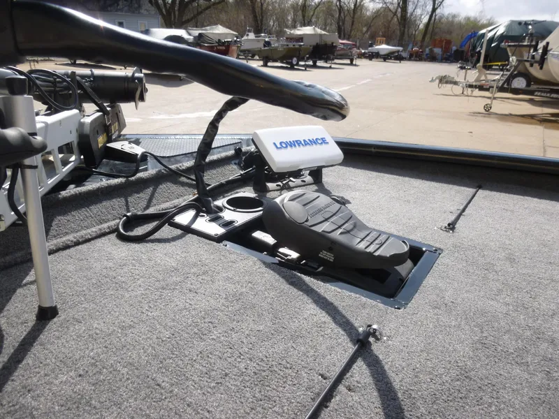 Slide: The Image of 2016 Tracker Pro Team 195 TXW boat deck with Lowrance fishfinder and foot pedal. - 33