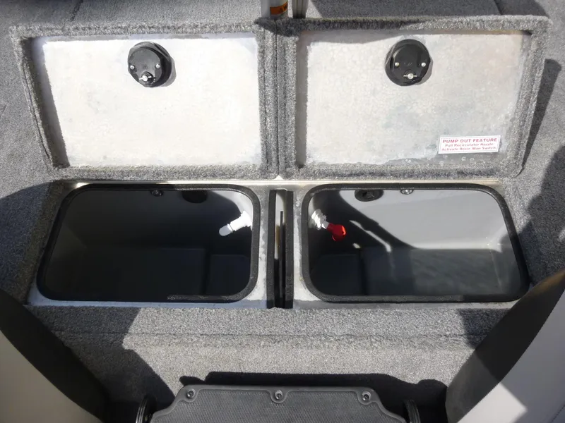 Slide: The Image of 2016 Tracker Pro Team 195 TXW boat storage compartments, open and empty. - 9