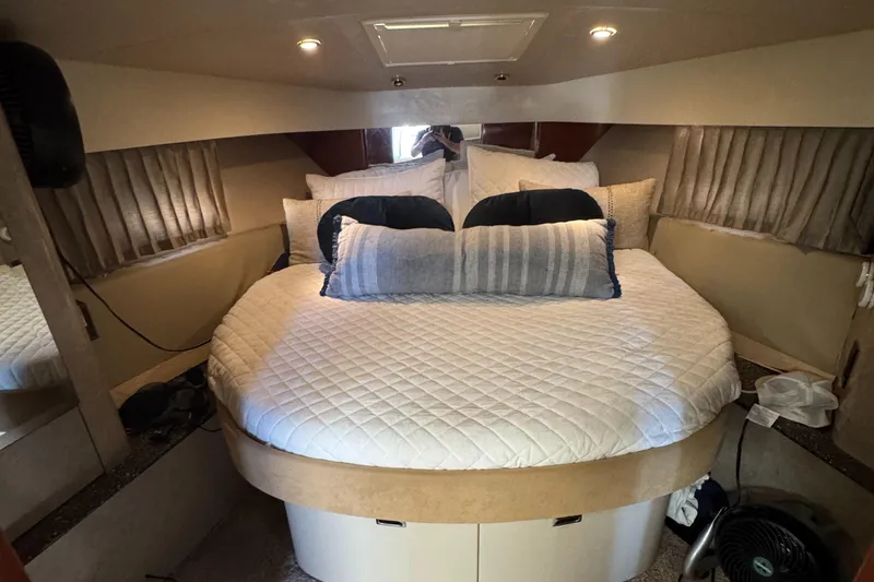 Slide: The Image of Luxurious 2004 Formula 40 PC yacht cabin with cozy bed and elegant decor. - 22