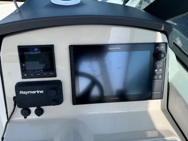 Slide: The Image of Dashboard of 2019 Boston Whaler 230 Vantage with Raymarine navigation system. - 11