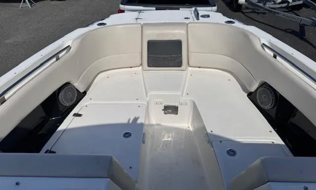 Slide: The Image of 2019 Boston Whaler 230 Vantage boat interior with spacious seating and storage compartments. - 4