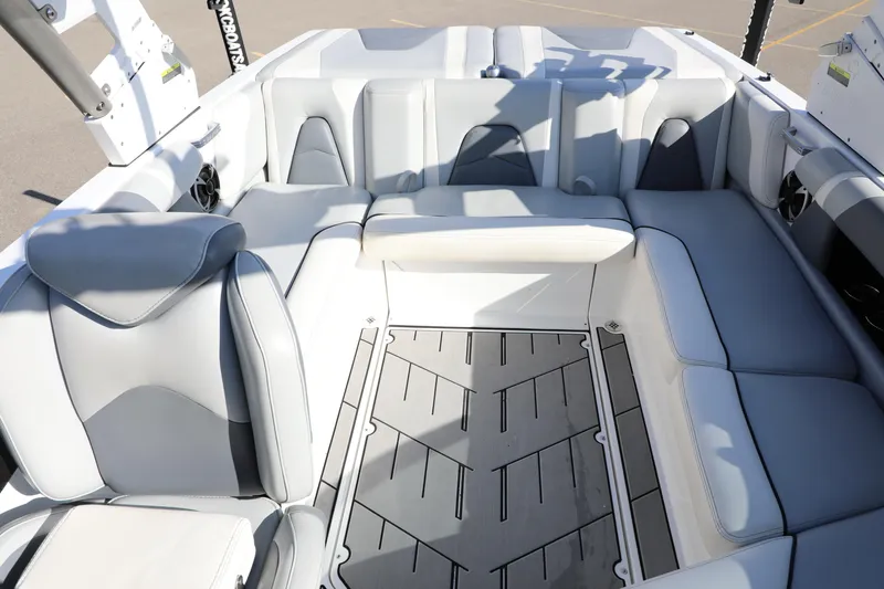 Slide: The Image of 2019 Malibu Wakesetter 21 VLX interior with gray seating and spacious layout. - 12