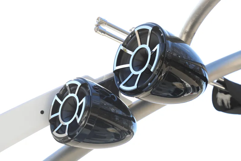 Slide: The Image of 2019 Malibu Wakesetter 21 VLX boat speakers on a metal tower. - 13