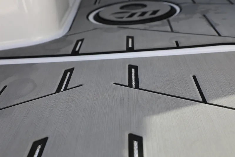 Slide: The Image of 2019 Malibu Wakesetter 21 VLX deck with sleek, modern design and logo detail. - 16