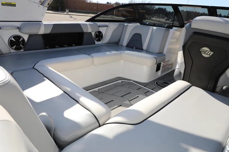 Slide: The Image of 2019 Malibu Wakesetter 21 VLX boat on trailer, parked outdoors. - 3