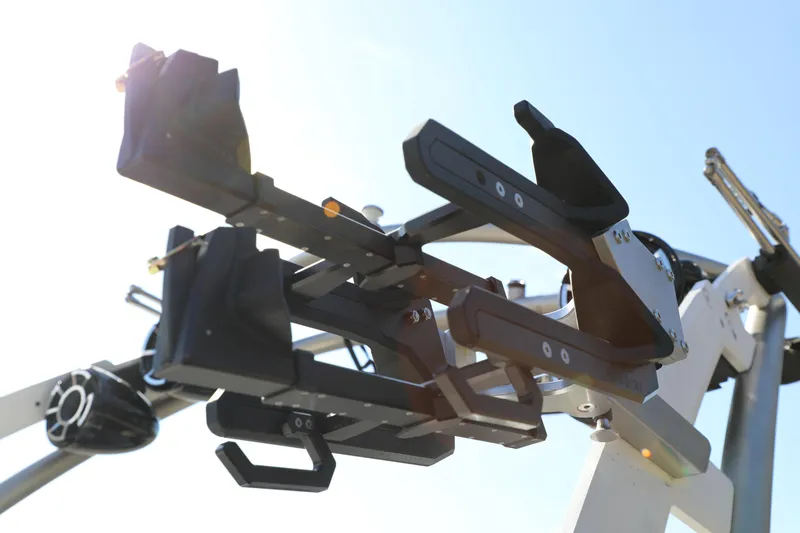 Slide: The Image of 2019 Malibu Wakesetter 21 VLX wakeboard rack against clear blue sky. - 7