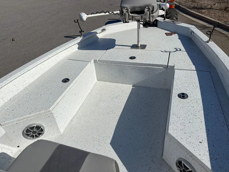 Slide: The Image of 2023 Xpress H22 boat deck with seating and mounted equipment. - 12