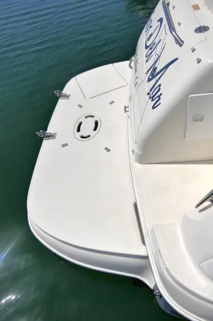 Slide: The Image of 2005 Sea Ray 280 Sundancer boat stern view with swim platform. - 43