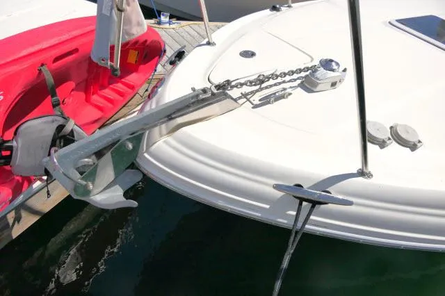 Slide: The Image of 2005 Sea Ray 280 Sundancer boat with anchor and chain at dock. - 49