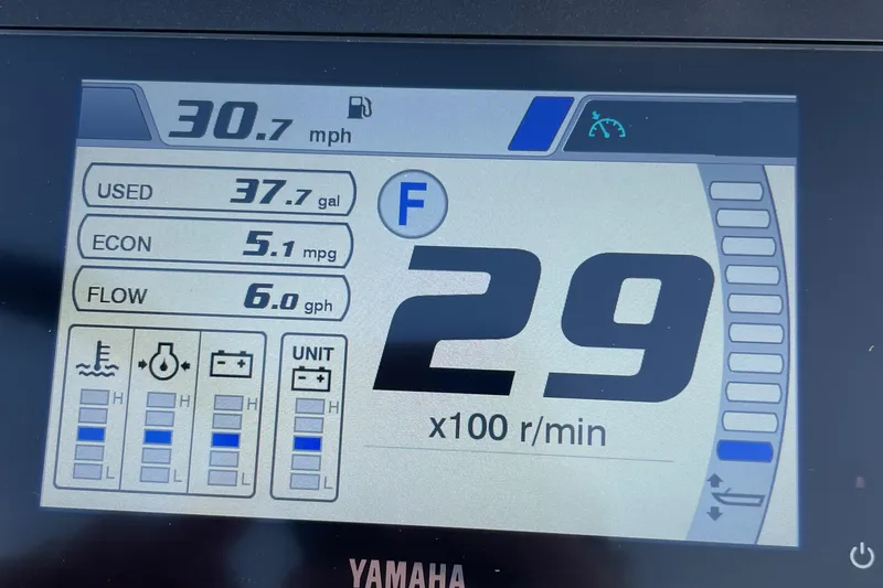 Slide: The Image of Dashboard display of a 2025 Contender 23 Bay showing speed, fuel usage, and engine metrics. - 20