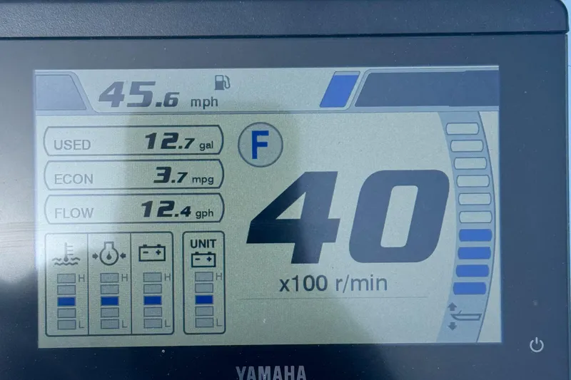 Slide: The Image of Digital display showing boat speed, fuel usage, and engine RPM for 2025 Contender 23 Bay. - 21