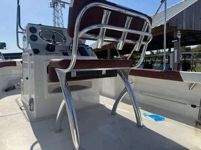 Slide: The Image of 2025 Parker 18SE Center Console boat interior with steering console and seating. - 11