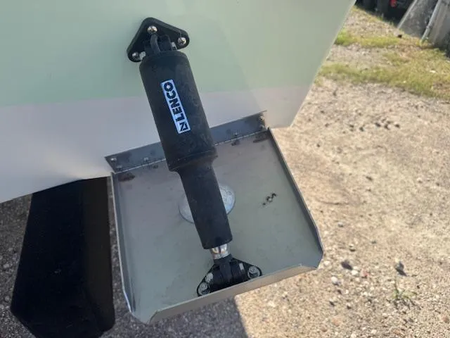 Slide: The Image of Trim tab with Lenco actuator on 2025 Parker 18SE Center Console boat. - 6
