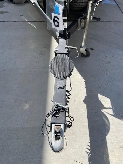 Slide: The Image of Trailer hitch of a 2020 Nitro Z19 Sport boat on concrete surface. - 14
