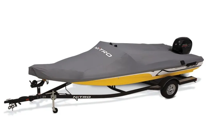 Slide: The Image of 2020 Nitro Z19 Sport boat with cover on trailer, yellow hull, gray cover. - 27