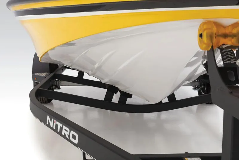 Slide: The Image of 2020 Nitro Z19 Sport boat on trailer, showcasing sleek yellow and white hull design. - 30
