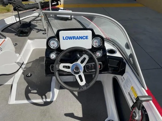 Slide: The Image of Cockpit of 2020 Nitro Z19 Sport boat with Lowrance electronics and steering wheel. - 7