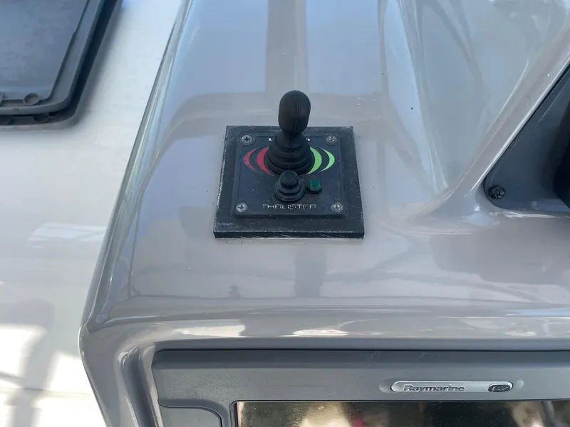 Slide: The Image of Joystick control on 2009 Robalo R305 Walkaround boat dashboard. - 22