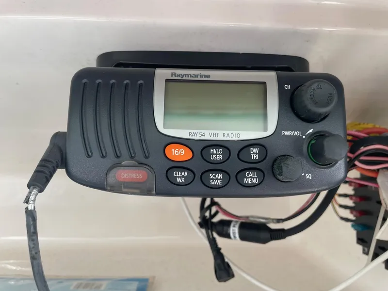 Slide: The Image of Raymarine VHF radio on 2009 Robalo R305 Walkaround boat dashboard. - 26