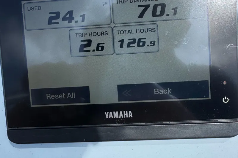 Slide: The Image of Yamaha display showing trip data for 2024 Contender 26 Bay boat. - 28