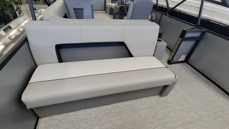 Slide: The Image of Modern interior seating of 2025 Qwest E22 boat, featuring sleek gray upholstery. - 10
