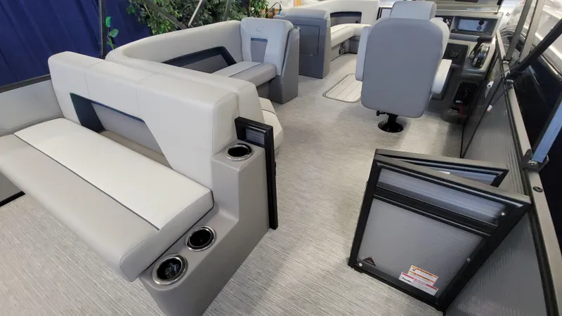 Slide: The Image of Luxurious interior of 2025 Qwest E22 boat with plush seating and modern amenities. - 8