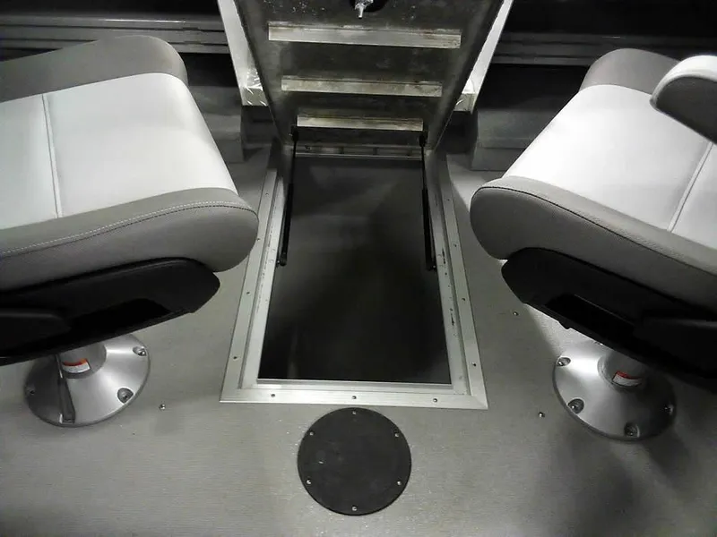 Slide: The Image of 2024 Smoker Craft Phantom 20 X2 OS boat interior with two seats and storage compartment. - 12