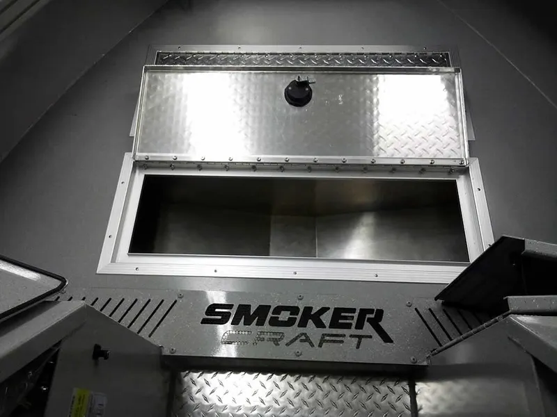 Slide: The Image of 2024 Smoker Craft Phantom 20 X2 OS boat storage compartment with metallic finish. - 13