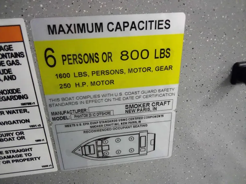 Slide: The Image of 2024 Smoker Craft Phantom 20 X2 OS capacity label: 6 persons or 800 lbs, 250 HP motor. - 17
