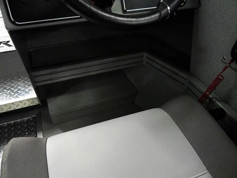 Slide: The Image of 2024 Smoker Craft Phantom 20 X2 OS interior, featuring steering wheel and seating area. - 19