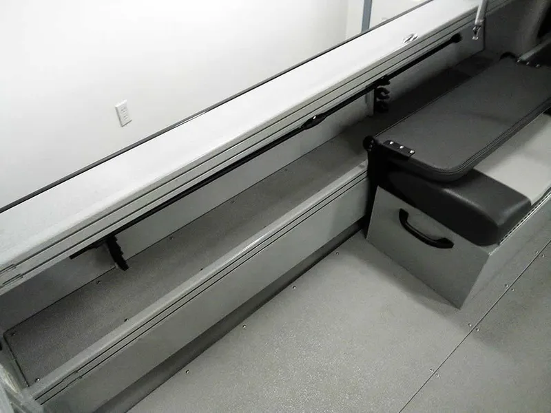 Slide: The Image of 2024 Smoker Craft Phantom 20 X2 OS interior seating and storage area. - 23