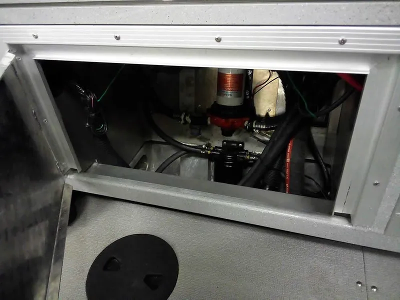 Slide: The Image of 2024 Smoker Craft Phantom 20 X2 OS boat interior wiring and components. - 27