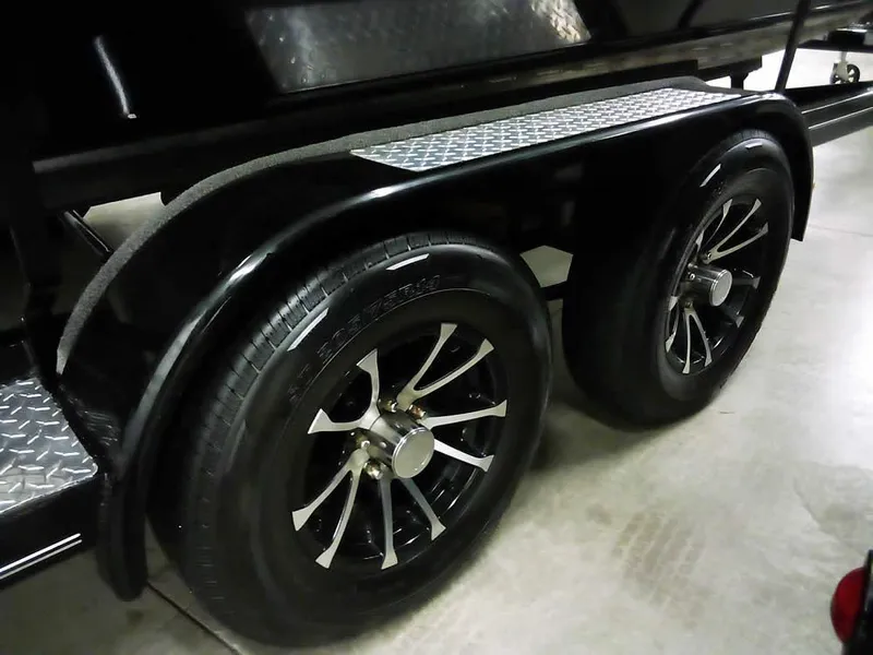 Slide: The Image of 2024 Smoker Craft Phantom 20 X2 OS trailer with dual black alloy wheels. - 34